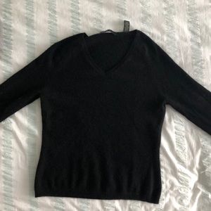 Cashmere V neck sweater .
